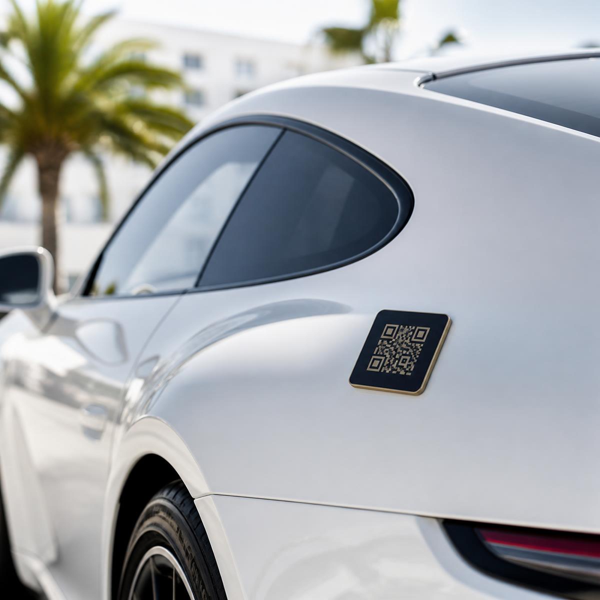 CarDate QR badge fitted to the rear quarter of a dark sports car